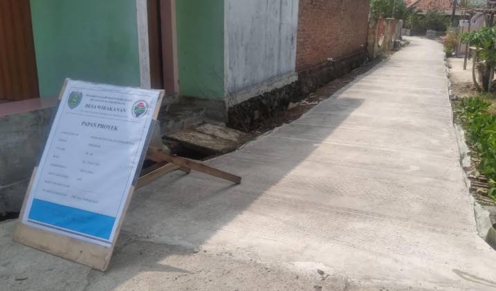 CuplikCom-Dana-Desa-TA-2024-Tahap-1,-Pemdes-Wirakanan-Laksanakan-Pembangunan-Jalan-Rabat-Beton-04052024080533-IMG-20240503-WA0039.jpg